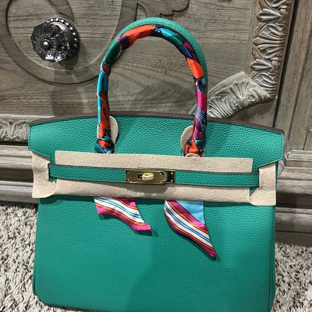 Elegant Green Handbag with Colorful Scarf Handle